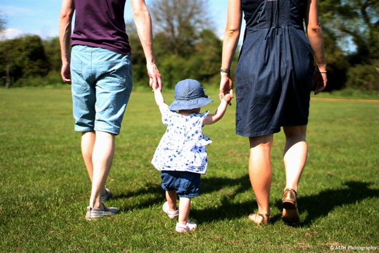 Strolling in the park with Mummy and Daddy