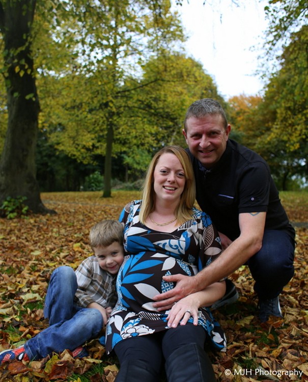 Family portrait in amongst the leaves