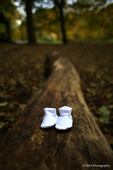 Baby booties down in the woods